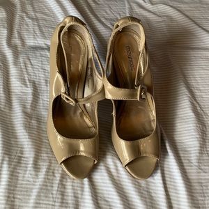 slightly worn nude heels